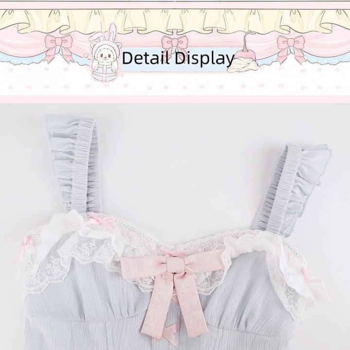 Top corset bleu manches papillon à nœuds roses