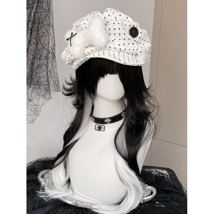 Béret à pois noir et blanc à boutons et os
