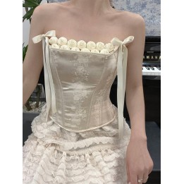 Corset baleiné à roses et nœuds à l'encolure
