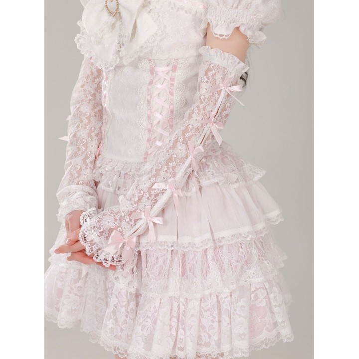 Manches amovibles roses ornées de petits nœuds