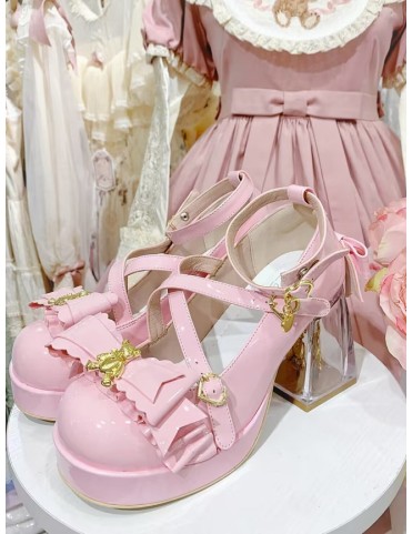 Mary Janes à plateforme rose avec nœuds croisés, boucle cœur et talon