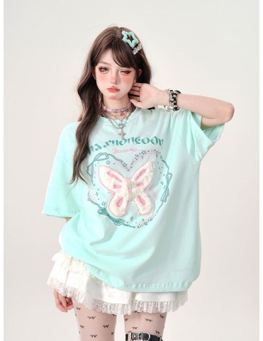 T-shirt oversize vert menthe brodé de papillons et lettré