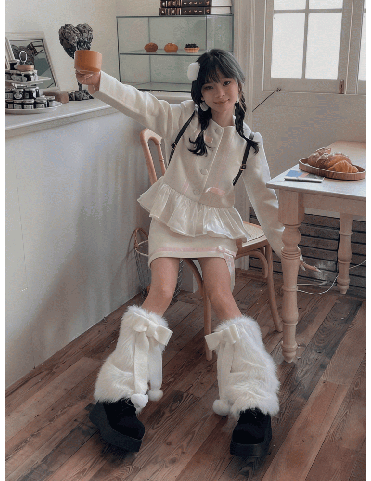 Chaussettes montantes en fausse fourrure avec grand nœud