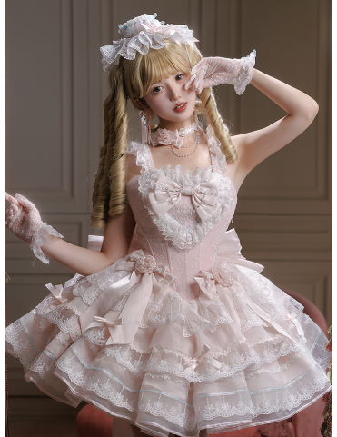Robe Lolita à volants superposés rose avec nœuds