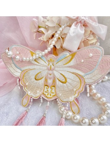 Sac brodé papillon avec pompons