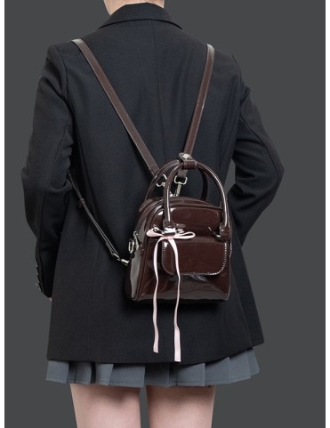 Sac à dos marron chocolat brillant avec nœud