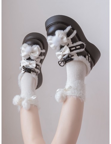 Sandales plates noires à nœud et doublure en peluche