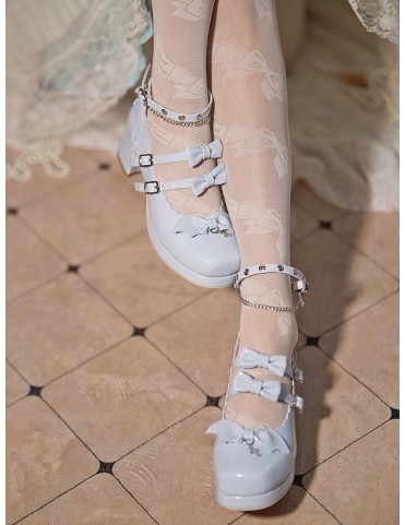 Ballerines Mary Janes bleu ciel décorées d'une croix métallique